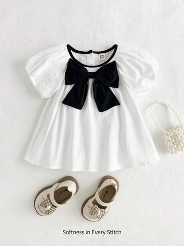 Cozy Cub Girls' Casual Cute White Princess Style Bow Soft & Comfy Contrast Color Short Sleeve Round Neck Blouse For Christening, Birthday Party, School, Casual Occasions Cozy Cub Girls' Casual Cute White Princess Style Bow Soft & Comfy Contrast Color Short Sleeve Round Neck Blouse For Christening, Birthday Party, School, Casual Occasions