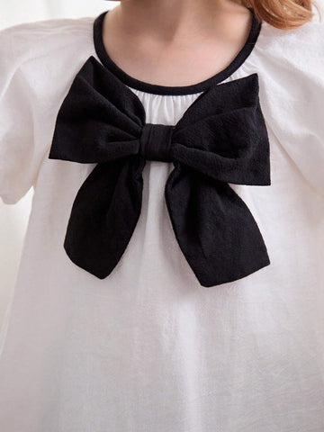 Cozy Cub Girls' Casual Cute White Princess Style Bow Soft & Comfy Contrast Color Short Sleeve Round Neck Blouse For Christening, Birthday Party, School, Casual Occasions Cozy Cub Girls' Casual Cute White Princess Style Bow Soft & Comfy Contrast Color Short Sleeve Round Neck Blouse For Christening, Birthday Party, School, Casual Occasions
