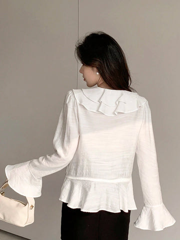 DAZY Women's Solid Color Relaxed Fit Bell Sleeve Shirt With Ruffle Hem And Tie Waist DAZY Women's Solid Color Relaxed Fit Bell Sleeve Shirt With Ruffle Hem And Tie Waist