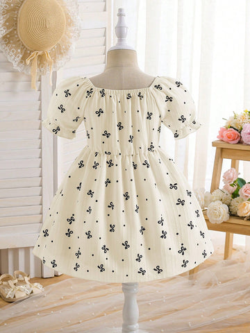 Girls Cute Bow Print Lantern Sleeve Mini Dress With Waist Tie, Paired With 3D Bow Straw Crossbody Bag, Casual Vacation, Party Wear, Summer Girls Cute Bow Print Lantern Sleeve Mini Dress With Waist Tie, Paired With 3D Bow Straw Crossbody Bag, Casual Vacation, Party Wear, Summer