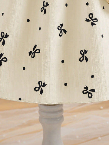 Girls Cute Bow Print Lantern Sleeve Mini Dress With Waist Tie, Paired With 3D Bow Straw Crossbody Bag, Casual Vacation, Party Wear, Summer Girls Cute Bow Print Lantern Sleeve Mini Dress With Waist Tie, Paired With 3D Bow Straw Crossbody Bag, Casual Vacation, Party Wear, Summer