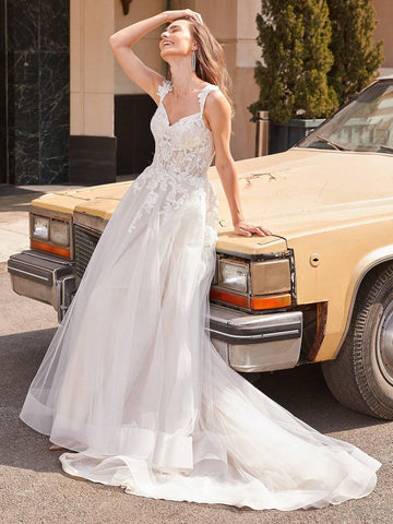 Glittering Sequin Embroidery Patchwork Train Spaghetti Strap Wedding Dress Glittering Sequin Embroidery Patchwork Train Spaghetti Strap Wedding Dress