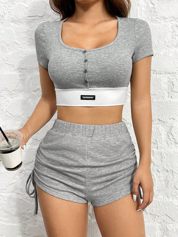 Gray Knitted Women's Short-Sleeved Top And Shorts Set With Alphabet Patch Gray Knitted Women's Short-Sleeved Top And Shorts Set With Alphabet Patch