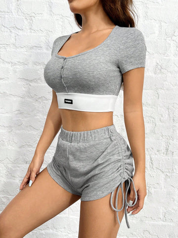 Gray Knitted Women's Short-Sleeved Top And Shorts Set With Alphabet Patch Gray Knitted Women's Short-Sleeved Top And Shorts Set With Alphabet Patch