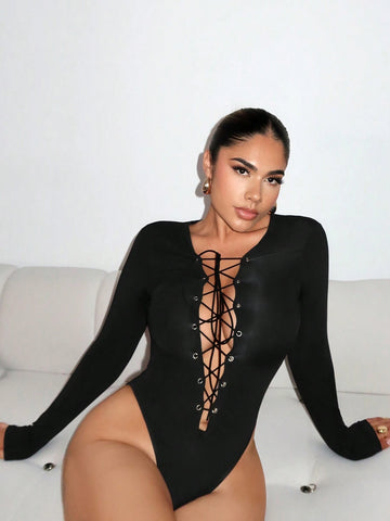 Women's Long Sleeve Deep V-Neck Criss-Cross Lace-Up Front Bodysuit Women's Long Sleeve Deep V-Neck Criss-Cross Lace-Up Front Bodysuit