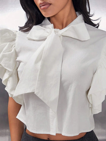Haute Solid Puff Sleeve Bow Neck Tie Button Up Blouse Haute Solid Puff Sleeve Bow Neck Tie Button Up Blouse
