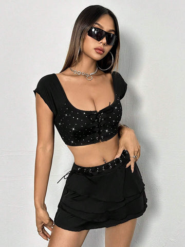 Ladies' Metallic Eyelets Square Neck Top And Skirt Set, Random Cutting Of Mesh, Random Selection Of Ties Ladies' Metallic Eyelets Square Neck Top And Skirt Set, Random Cutting Of Mesh, Random Selection Of Ties