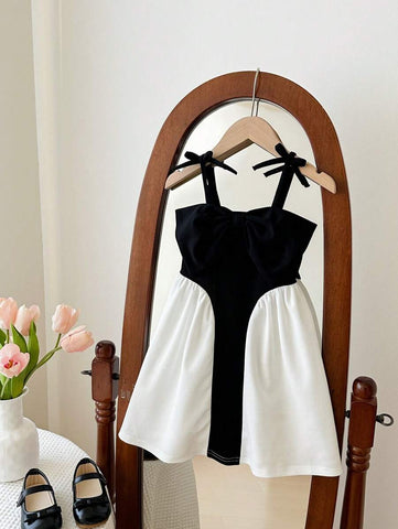 Young Girls' Fashionable Elegant Classic Black Spaghetti Strap Bow Decor Contrast Color Hem Party Dress Young Girls' Fashionable Elegant Classic Black Spaghetti Strap Bow Decor Contrast Color Hem Party Dress