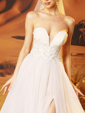 Sexy High Slit Lace Wedding Dresses For Women With Train Lace Up Back Deep V-Neck Luxury Ivory Tulle Bridal Wedding Gowns With Hand Beading A-Line Formal Dress For Beach Wedding Party Sexy High Slit Lace Wedding Dresses For Women With Train Lace Up Back Deep V-Neck Luxury Ivory Tulle Bridal Wedding Gowns With Hand Beading A-Line Formal Dress For Beach Wedding Party