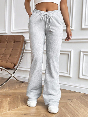 Women's Solid Color Drawstring Waist Pocketing Shorts Women's Solid Color Drawstring Waist Pocketing Shorts