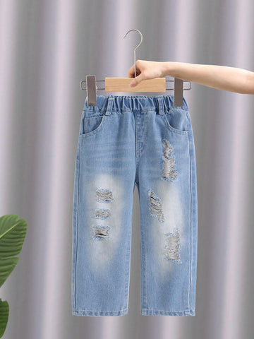 Young Girl Basic Casual Street Style Mid-Blue Washed Ripped Elastic High Waist Tapered Jeans Young Girl Basic Casual Street Style Mid-Blue Washed Ripped Elastic High Waist Tapered Jeans