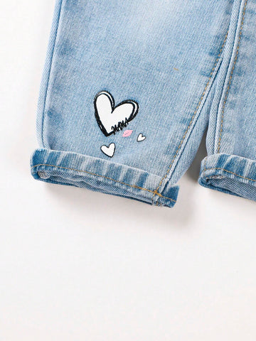 Young Girl Enzyme Washing+Light Blue Color Wash+Cut-Out Detail+Heart Print Jeans Young Girl Enzyme Washing+Light Blue Color Wash+Cut-Out Detail+Heart Print Jeans