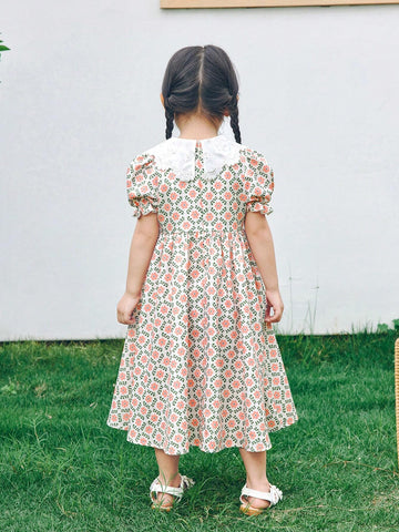 Young Girl Loose Casual Weave Floral Dress With Doll Collar And Puff Sleeves Young Girl Loose Casual Weave Floral Dress With Doll Collar And Puff Sleeves