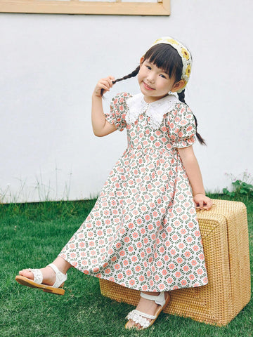 Young Girl Loose Casual Weave Floral Dress With Doll Collar And Puff Sleeves Young Girl Loose Casual Weave Floral Dress With Doll Collar And Puff Sleeves