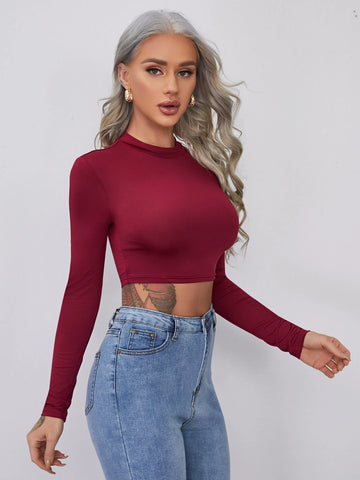 evolu Form-Fitting Mock Neck Crop Top evolu Form-Fitting Mock Neck Crop Top