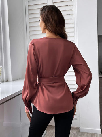 Solid Belted Asymmetrical Hem Blouse Solid Belted Asymmetrical Hem Blouse
