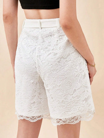 BIZwear Solid Lace Overlay Belted Shorts
