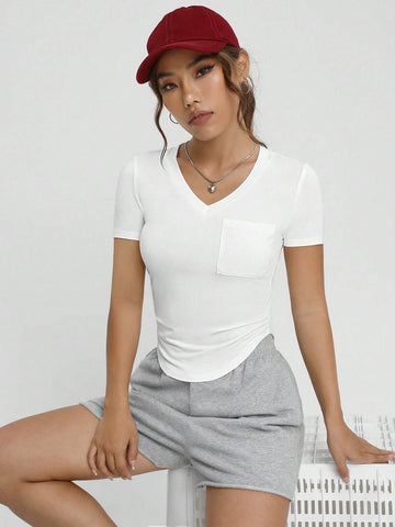 Unity Solid Pocket Patched Curved Hem Tee