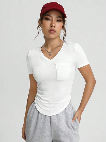 Unity Solid Pocket Patched Curved Hem Tee