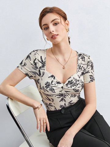 BIZwear Floral Print Sweetheart Neckline Twist Front Tee