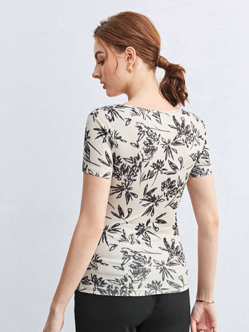 BIZwear Floral Print Sweetheart Neckline Twist Front Tee