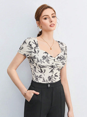 BIZwear Floral Print Sweetheart Neckline Twist Front Tee