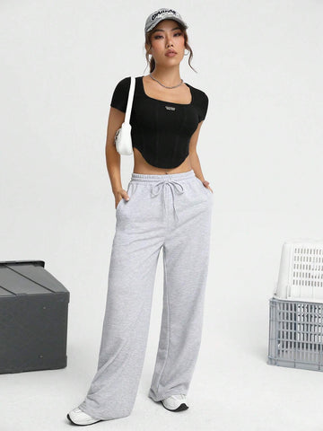 Letter Patched Detail Curved Hem Crop Tee