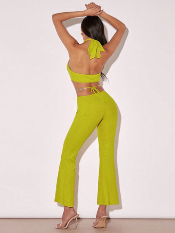 Plunging Neck Backless Flare Leg Halter Jumpsuit