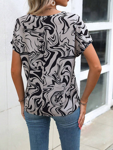 Allover Print Batwing Sleeve Blouse