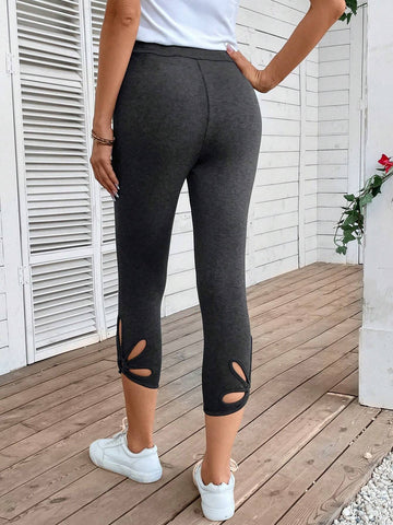 EMERY ROSE Cut Out Twist Hem Capri Leggings