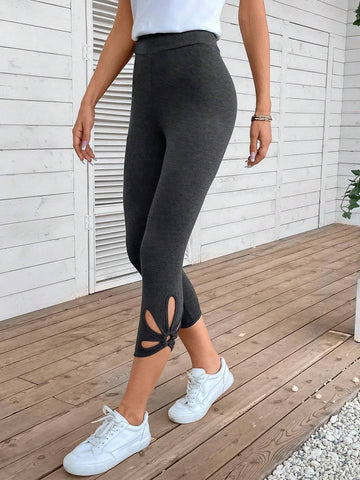 EMERY ROSE Cut Out Twist Hem Capri Leggings
