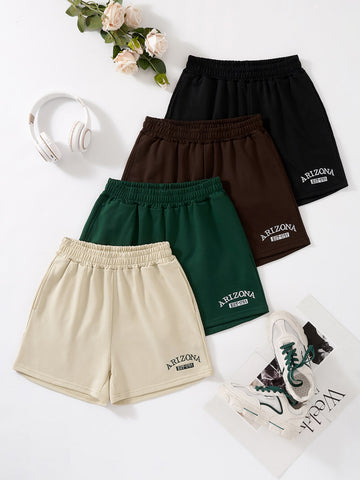 4pcs Letter Graphic Slant Pockets Shorts