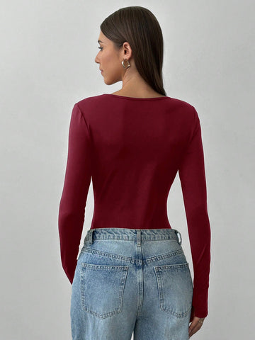 Aloruh Women Deep V-Neck Metal Buckle Decor Long Sleeve Bodysuit