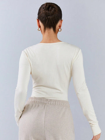 Athîral Women Plain Front Button Long Sleeve Casual Bodysuit