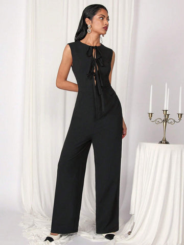 COSMINA Women's Elegant Solid Color Sleeveless Tied Black Jumpsuit For Commuting