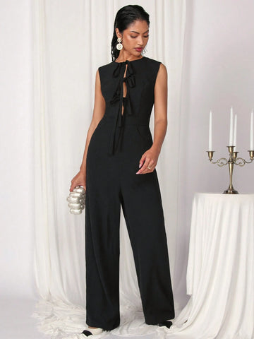 COSMINA Women's Elegant Solid Color Sleeveless Tied Black Jumpsuit For Commuting