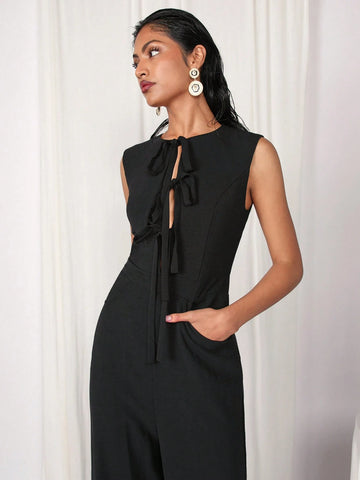 COSMINA Women's Elegant Solid Color Sleeveless Tied Black Jumpsuit For Commuting