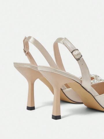 Ladies' Apricot, Nude, And Ivory Colored Elegant High Heels For Dressy Occasions.