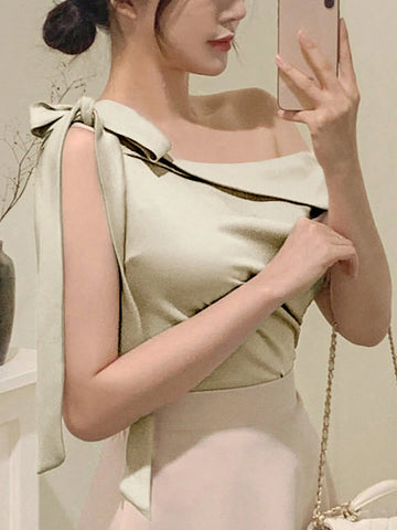 DAZY Women's Oblique Shoulder Bowknot Glossy High Elasticity Blouse