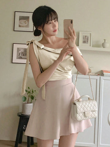 DAZY Women's Oblique Shoulder Bowknot Glossy High Elasticity Blouse