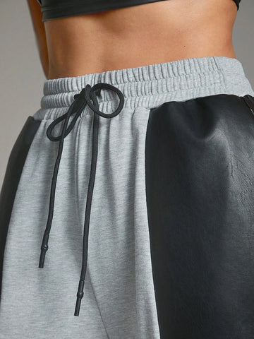Denimoi Wide Leg PU Leather Mixed Sweatpants With Pockets