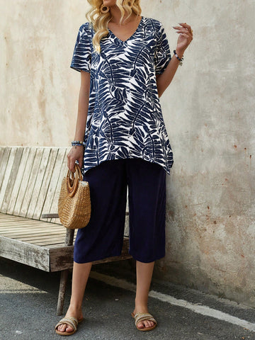 EMERY ROSE Women's Summer Blue Short-Sleeve Top With Plant Print And Asymmetrical Hem, Paired With Plain Trousers As A Two-Piece Set.