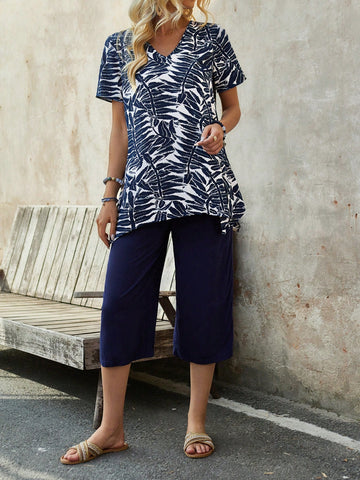 EMERY ROSE Women's Summer Blue Short-Sleeve Top With Plant Print And Asymmetrical Hem, Paired With Plain Trousers As A Two-Piece Set.
