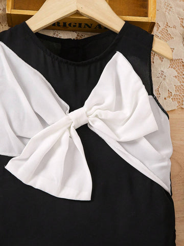 Girl Top With Black And White Color Block Design And Elegant Bow