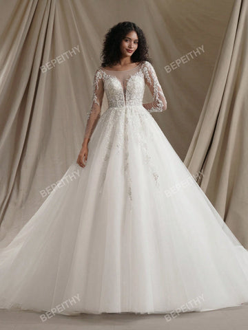 New Arrival Princess Long Sleeves Shinny Wedding Dresses Sexy Deep V Neck Bride Ivory Glitter Bridal Gown With Beading Bodice