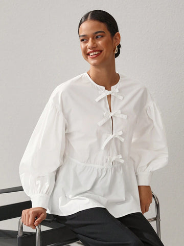 Oxana Women'S White Cotton Peplum Blouse With Balloon Sleeves And Front Bow Closure