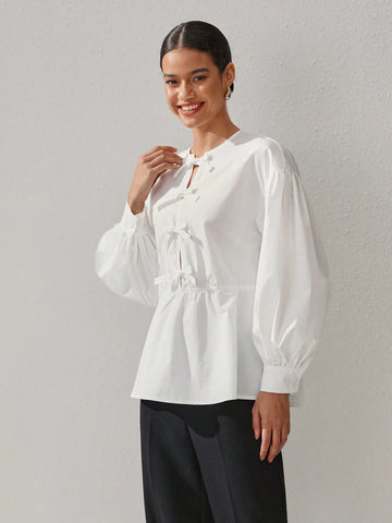 Oxana Women'S White Cotton Peplum Blouse With Balloon Sleeves And Front Bow Closure