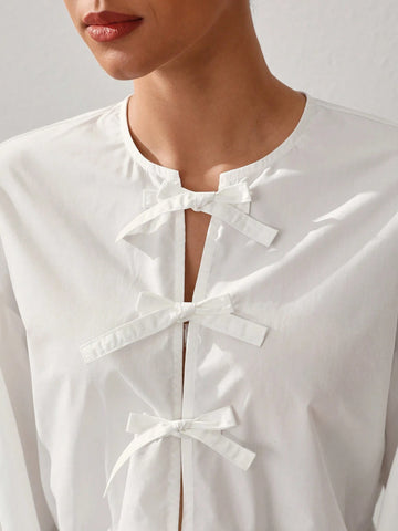 Oxana Women'S White Cotton Peplum Blouse With Balloon Sleeves And Front Bow Closure