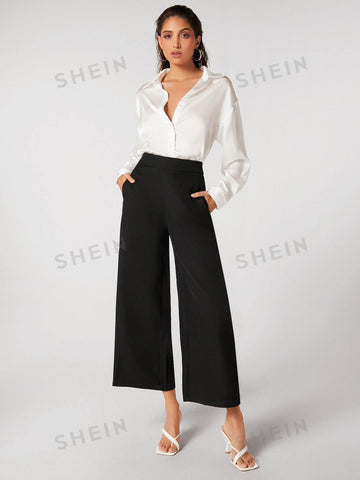BIZwear Black Wide-Leg Capri Pants With Front Seam Detail