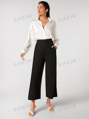 BIZwear Black Wide-Leg Capri Pants With Front Seam Detail
